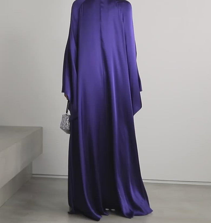 Model Wearing SemSem Embellished silk-satin kaftan.