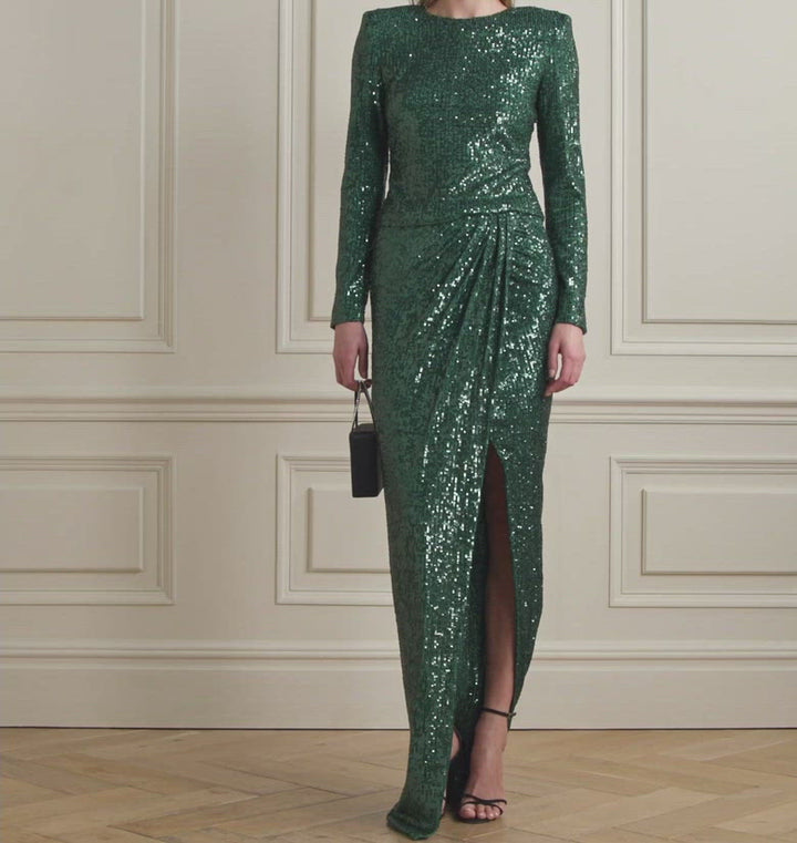 Model in SemSem Wrap-Effect Sequined Stretch-Tulle Midi Skirt.