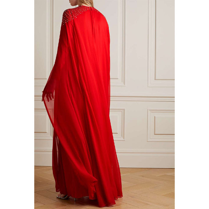 Model Wears Cape-Effect Crystal-Embellished Silk-Chiffon Gown.