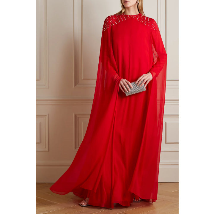 Model Wears Cape-Effect Crystal-Embellished Silk-Chiffon Gown.