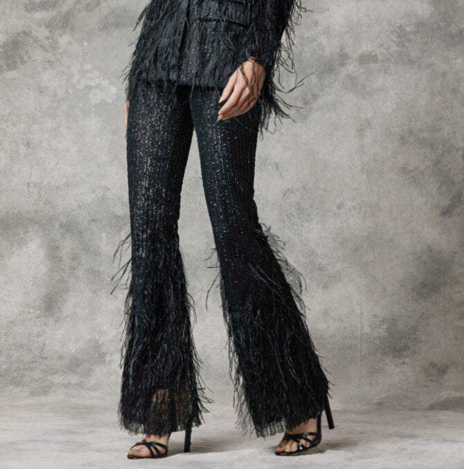 Model Wears SemSem Black Sequin Feather Pants.