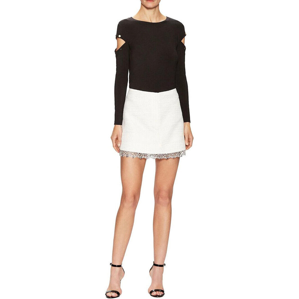 Model Wears SemSem Samia Skort - Cream.