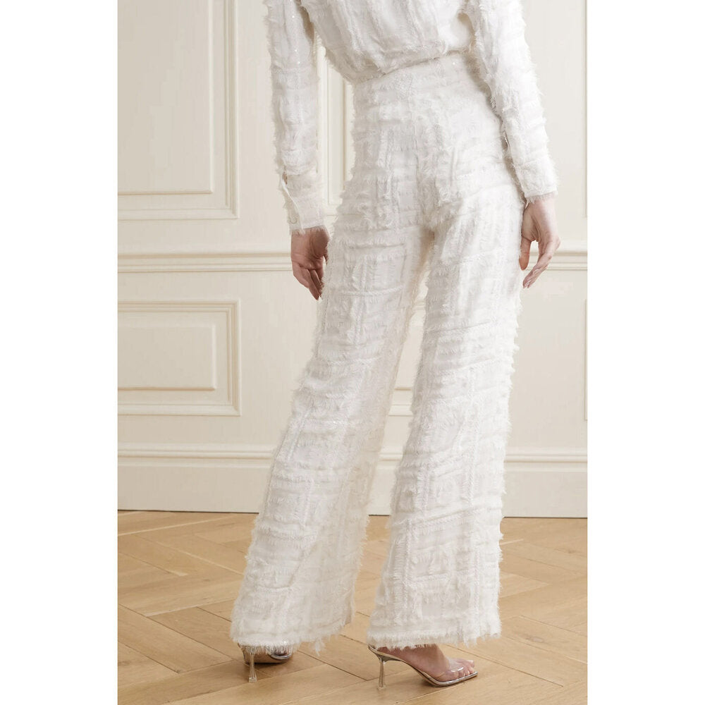 Model wears SemSem Silk Chiffon Embellished Wide Leg Pants.