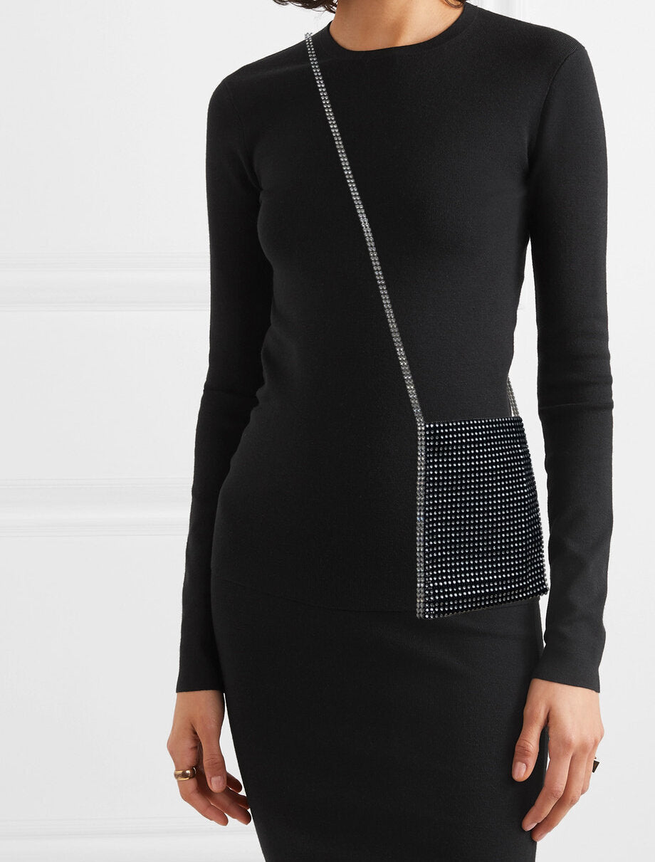 Model wears SemSem Crystal Evening Bag.